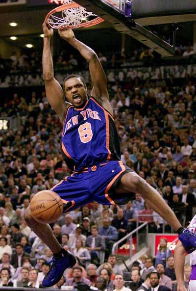Sprewell Hangs On The Rim After A Dunk